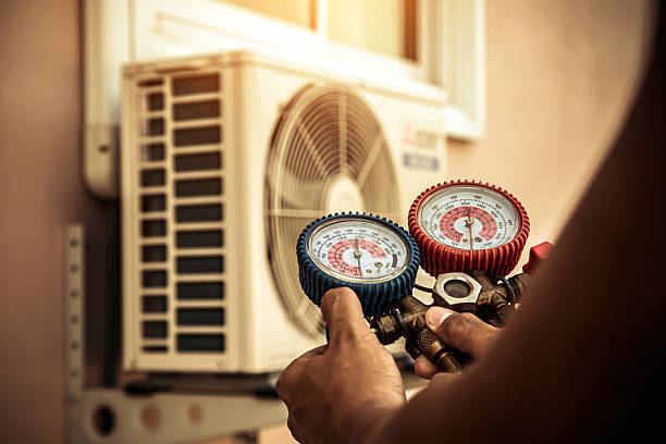 Professional Hvac technician working in Pinson, AL